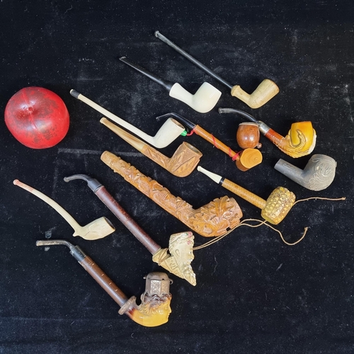 171 - A brilliant collection of 10 antique and vintage pipes including 19th century clay examples and orna... 