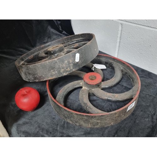 737 - Two superb antique cast iron machinery wheels. Fabulous spiral design which will looks amazing when ... 