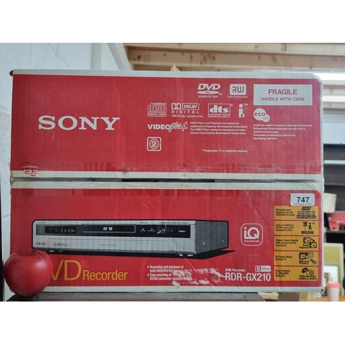 747 - A sealed Sony DVD recorder model RDR/GX20. Complete with original box, remote papers etc. Allows you... 