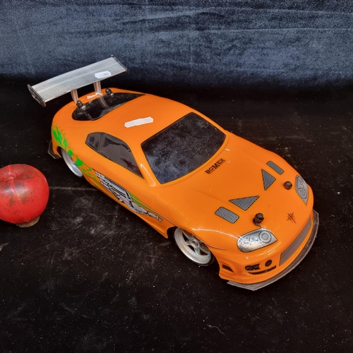 182 - A battery operated Toyota Supra racer car made for the promotion of the first 'Fast and Furious' mov... 