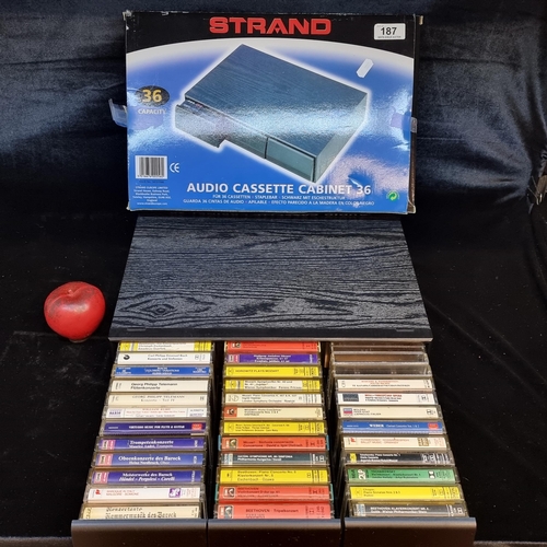 187 - A Strand audio cassette cabinet 36. In original box. With a full selection of Mostly classical tapes... 