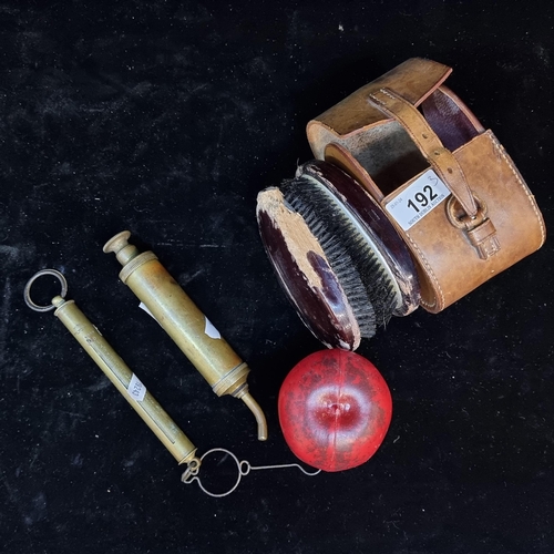 192 - Four vintage items including two shoe polishing brushes with a genuine leather case along with a por... 