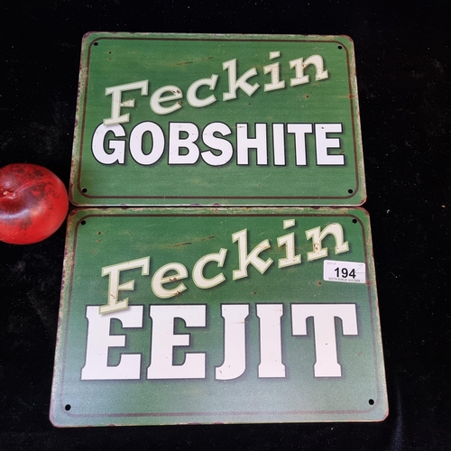 194 - Two metal plaques with humorous phrases.