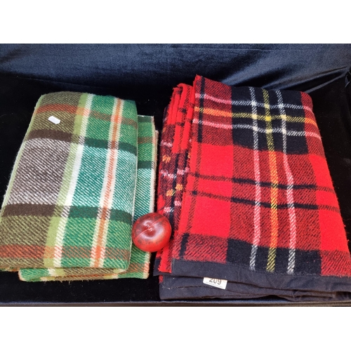 209 - Two lovely vintage warm travel blankets featuring a tartan design in shades of green and red.