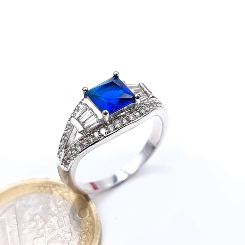 461 - A very pretty blue stone cocktail ring, size P, weight 3.41 grams, boxed.