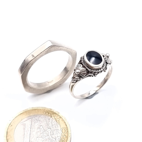 467 - A sterling silver onyx stone ring, size M, weight 2.65 grams together with a further Gucci marked si... 