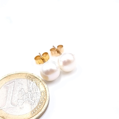 479 - A pair of 9K gold pearl stud earrings, Total weight 1.68 grams, boxed.