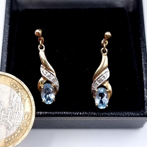 480 - Star lot : A pair of 9K gold aquamarine and diamond drop stud earrings, total weight 1.74 grams, box... 