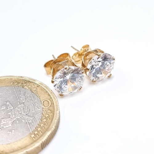 485 - A pair of 9K gold gem stone stud earrings, total weight 1.43 grams.