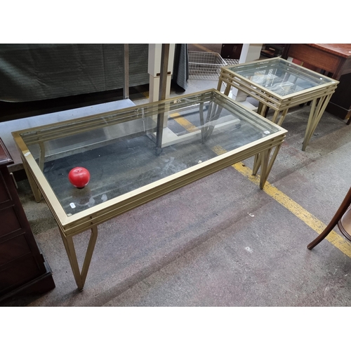 552 - Two matching modern coffee tables including a rectangular and square example. With brass frames and ... 