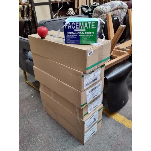 559 - A lot of 6 large boxes each containing 50 new Facemate surgical masks. 300 masks total.  Medical qua... 