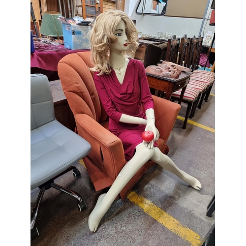 564 - A full-size female commercial display mannequin in a seated position. With articulated limbs, blonde... 