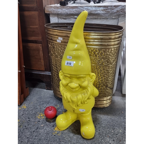 610 - A very cheerful large bright yellow garden gnome in a glossy finish. A great addition to any home or... 