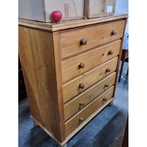 630 - Star Lot : A wonderful well made solid golden pine chest of drawers featuring five good sized pull o... 