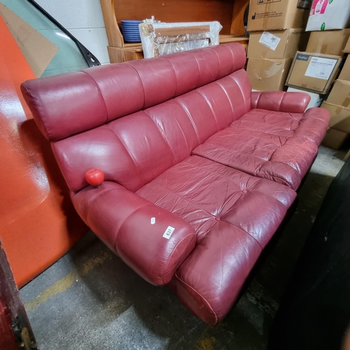 637 - Star Lot : A super mid century 1970s stylish red leather two seater sofa sat on chrome feet. It's a ... 