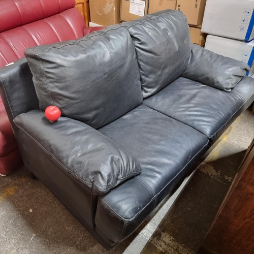 638 - A sleek and extremely comfortable black leather two seater sofa.