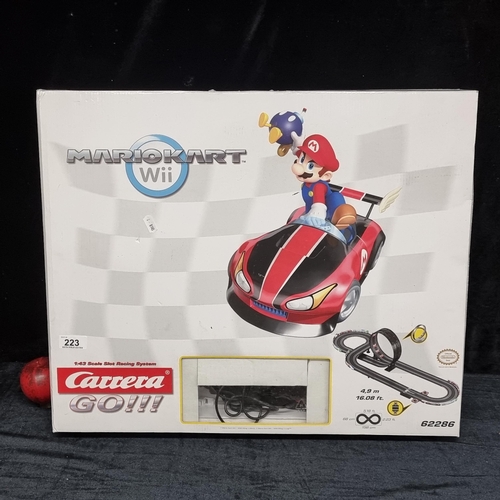 223 - A brand new boxed Mario Kart Wii Carrera Go! Scalextric slot car racing track playset. RRP €79.99 on... 