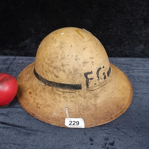 229 - A British WWII fire guard Zuckerman helmet.