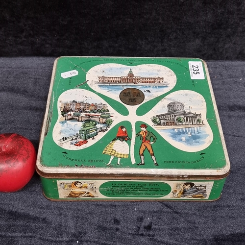 235 - A fantastic vintage Dublin themed Jacobs biscuit tin depicting iconic landmarks of Dublin city.