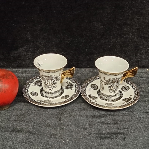 248 - A fabulous pair of ornate porcelain demitasse cups and saucers in the Versace design by Rosenthal. B... 