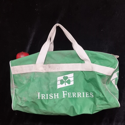 265 - A mixed lot containing a retro Irish Ferries duffel bag, a cycling jersey and a selection of America... 