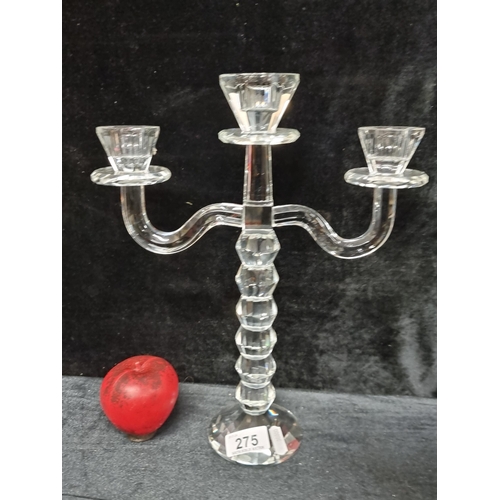 275 - A stylish heavy cut glass candelabra with three branches, boasting facet cut detailing throughout. I... 