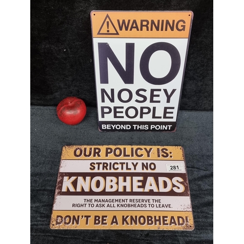 281 - Two novelty cast metal wall signs reading 