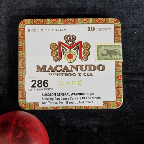 286 - A sealed box of 10 Macanudo exquisite cigars.