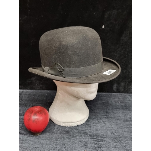 293 - A handsome T.W. Stafford Cornmarket, Belfast hatter fine felt Bowler hat. Features hand stitched lea... 