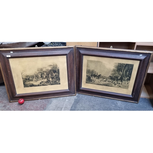 311 - A very large pair of antique prints featuring hunting scenes titled 