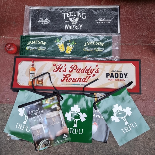 339 - A collection of four pub items. Including Jameson and Paddy Irish Whiskey branded beer drip mats and... 