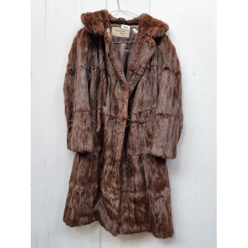 349 - Star Lot : A very stylish vintage genuine mink fur coat from Southern Furs Dublin. With pockets, hoo... 