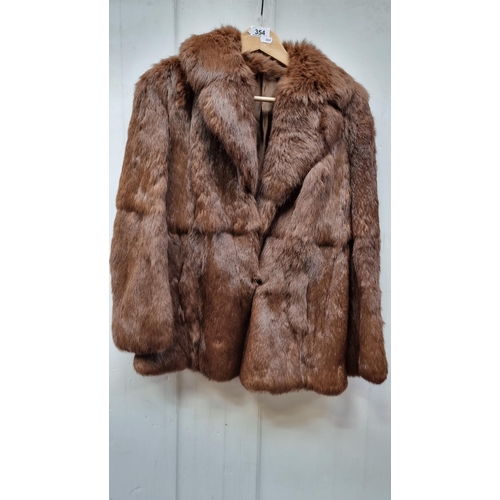 354 - A stylish genuine fur jacket from Julian Vard, made in Ireland. Size UK 14