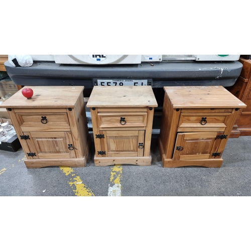 379 - A set of 3 charming wooden bedside lockers with a drawer and cabinet each.