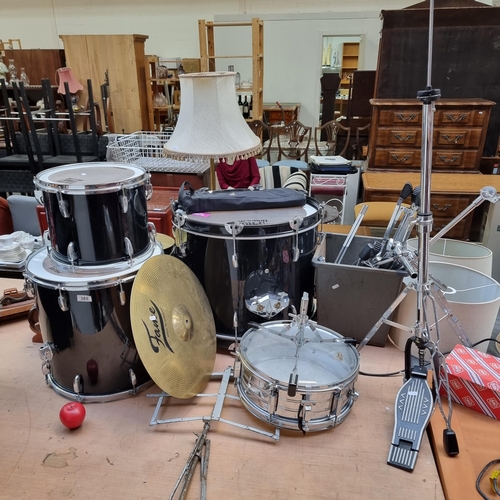 385 - Star Lot: A high quality drum set including five drums from Music Store Pro Drumline in varying size... 