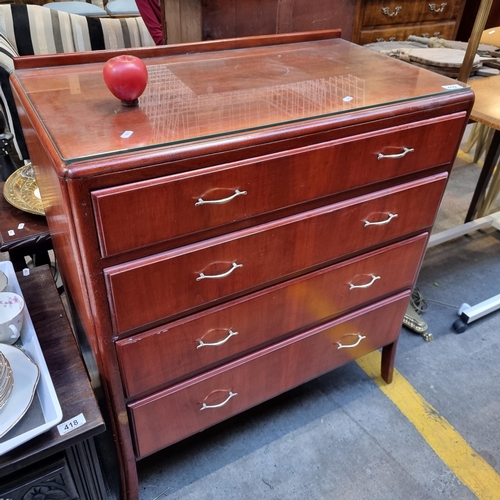 419 - A handsome Mid Century dresser with four full length drawers, gallery back and glass protector.