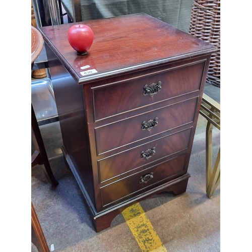 430 - An elegant cabinet from Master Piece ideal for displaying and storing of a record player and vinyl r... 