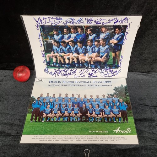 116 - Two laminated prints showing the Dublin senior football team of 1993, one featuring the printed sign... 