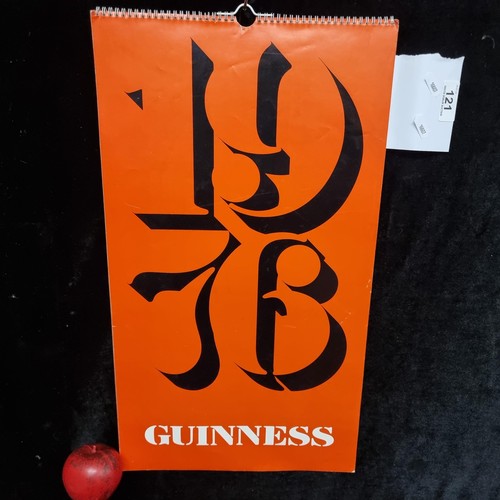 121 - A super retro Guinness branded wall calendar dating to 1976 featuring comical illustrations by Noel ... 