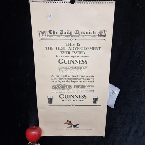 122 - A super retro Guinness branded wall calendar dating to 1996 featuring advertising heritage throughou... 