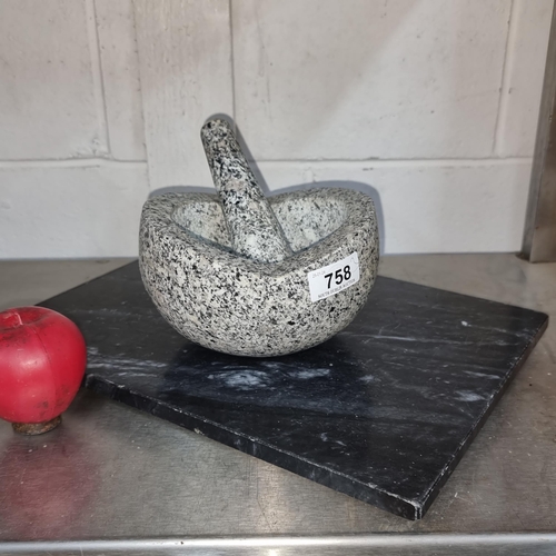 758 - Three items comprising of fantastic large Granite mortar and pestle as well as a black marble choppi... 