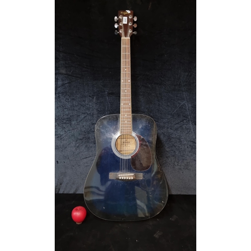 777 - A Hohner handcrafted acoustic guitar model Countryman. In a navy blue and brown colourway. With all ... 