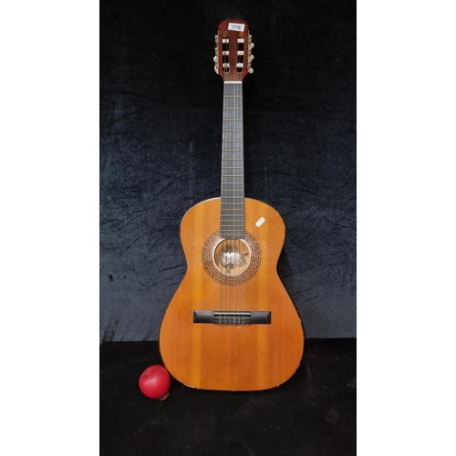 778 - A Musician Inc. BM acoustic guitar in brown and black finish. With all strings.