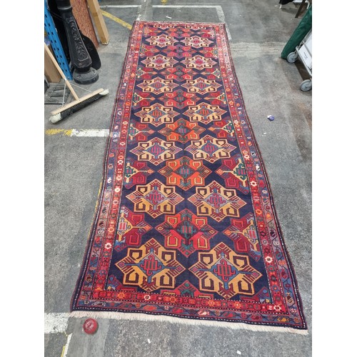 900 - Star Lot: A gorgeous and large hand woven Iranian, Meschkin, Persian woolen rug boasting a fabulous ... 