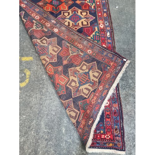 900 - Star Lot: A gorgeous and large hand woven Iranian, Meschkin, Persian woolen rug boasting a fabulous ... 