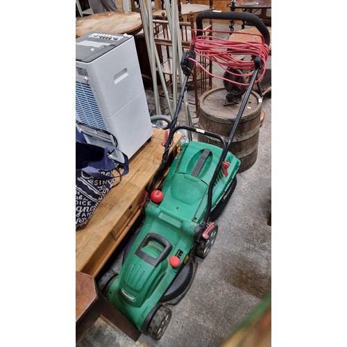 659 - A high quality Qualcast lawn mower. You will be looking for this in 5 weeks.