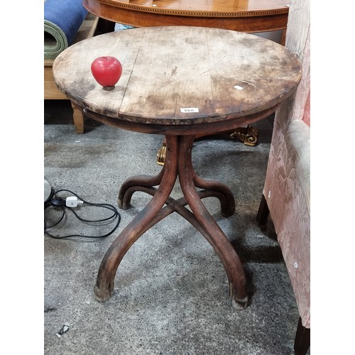 668 - A beautifully crafted antique bentwood side table.  From the fabulous stately Montebello House in Ki... 