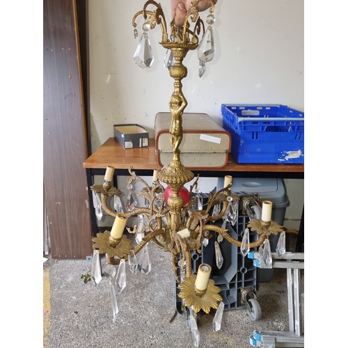 856 - Stat Lot : An extravagant vintage 6-branch brass chandelier with a female form for the body of the l... 