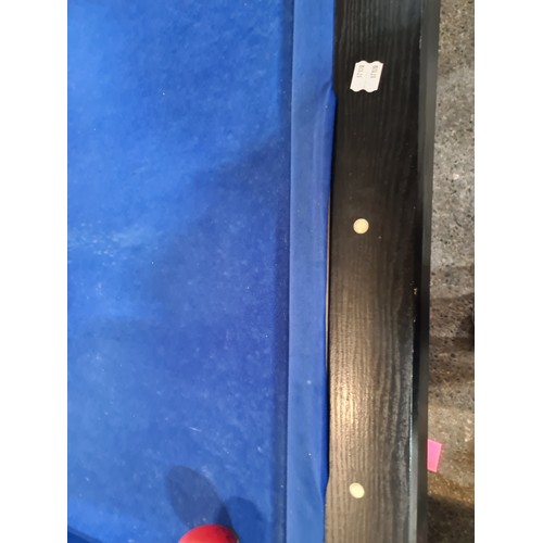 842 - A 6 x 3ft. feet Wooden pool table with black ash wood surround. With a full set of pool balls and 2 ... 