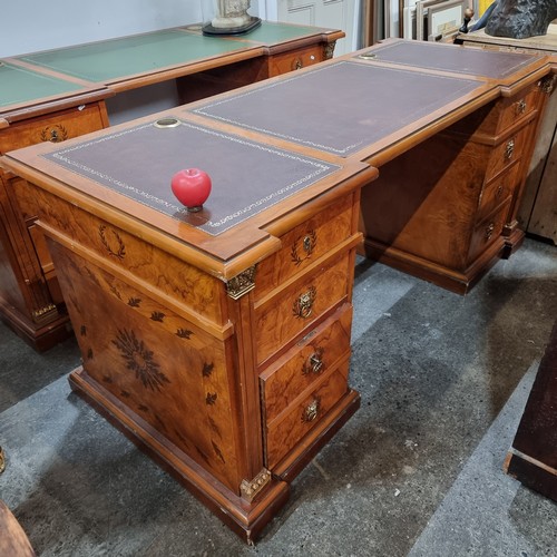 684 - Star Lot : A monumental large directors desk featuring a tooled leather top in three parts, with fou... 